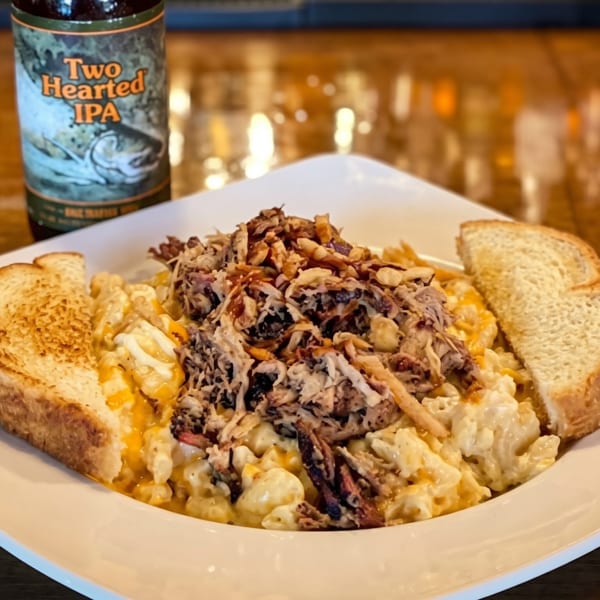 Pulled pork mac and cheese with toasted bread and a bottle of Two Hearted IPA.